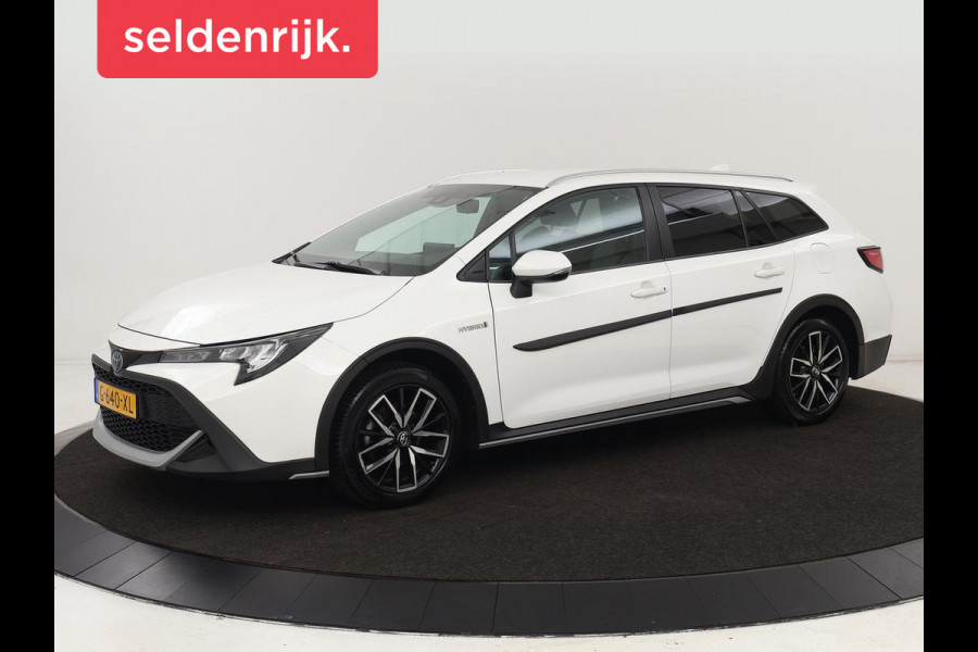 Toyota Corolla 1.8 Hybrid Trek | Stoelverwarming | Adaptive cruise | Trekhaak | Carplay | Camera | Keyless | Full LED | Navigatie | Climate control