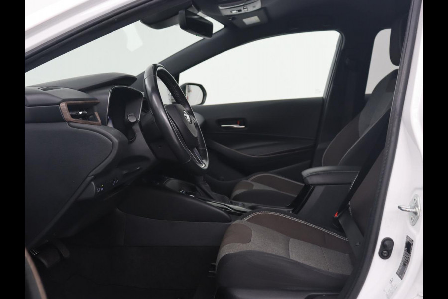 Toyota Corolla 1.8 Hybrid Trek | Stoelverwarming | Adaptive cruise | Trekhaak | Carplay | Camera | Keyless | Full LED | Navigatie | Climate control