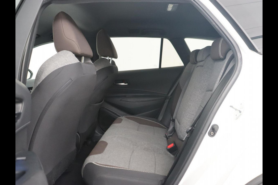 Toyota Corolla 1.8 Hybrid Trek | Stoelverwarming | Adaptive cruise | Trekhaak | Carplay | Camera | Keyless | Full LED | Navigatie | Climate control