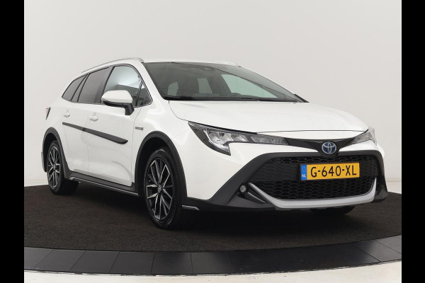 Toyota Corolla 1.8 Hybrid Trek | Stoelverwarming | Adaptive cruise | Trekhaak | Carplay | Camera | Keyless | Full LED | Navigatie | Climate control