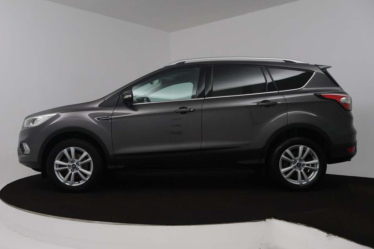 Ford Kuga 1.5 EcoBoost Titanium (PARKEERSENSOREN, ACHTERUITRIJCAMERA, LANE-ASSIST, CRUISE CONTROL, NAVIGATIE, SONY AUDIO) Ford Kuga 1.5 EcoBoost Titanium (PARKEERSENSOREN, ACHTERUITRIJCAMERA, LANE-ASSIST, CRUISE CONTROL, NAVIGATIE, SONY AUDIO)