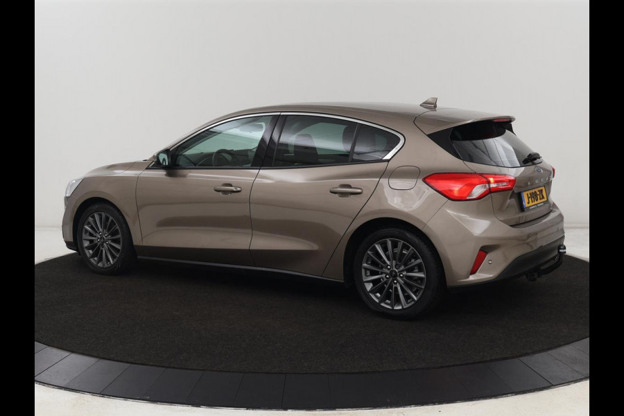 Ford Focus 1.0 EcoBoost Titanium | Trekhaak | Stoel & stuurverwarming | Carplay | Navigatie | Climate control | Keyless | Cruise control | Parkeerhulp | Bluetooth
