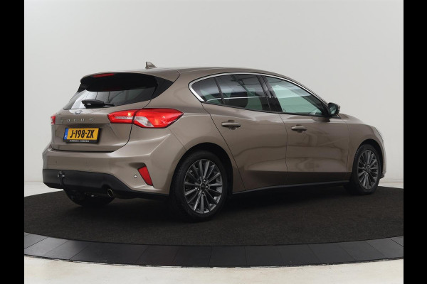 Ford Focus 1.0 EcoBoost Titanium | Trekhaak | Stoel & stuurverwarming | Carplay | Navigatie | Climate control | Keyless | Cruise control | Parkeerhulp | Bluetooth