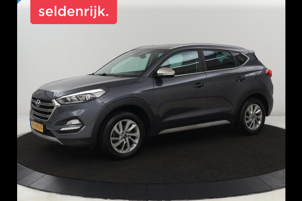 Hyundai Tucson 1.6 GDi Comfort | Trekhaak | Camera | Achterbankverwarming | Navigatie | Stoelverwarming | Climate control | Parkeerhulp | Cruise control | DAB | Regensensor Hyundai Tucson 1.6 GDi Comfort | Trekhaak | Camera | Achterbankverwarming | Navigatie | Stoelverwarming | Climate control | Parkeerhulp | Cruise control | DAB | Regensensor