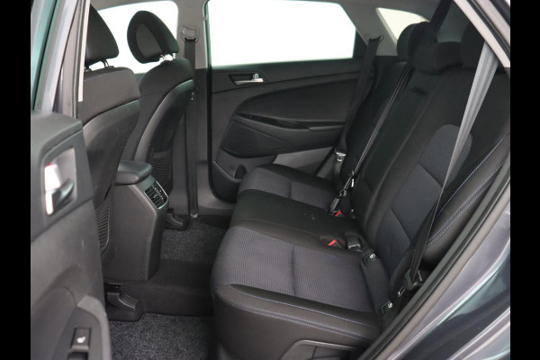 Hyundai Tucson 1.6 GDi Comfort | Trekhaak | Camera | Achterbankverwarming | Navigatie | Stoelverwarming | Climate control | Parkeerhulp | Cruise control | DAB | Regensensor Hyundai Tucson 1.6 GDi Comfort | Trekhaak | Camera | Achterbankverwarming | Navigatie | Stoelverwarming | Climate control | Parkeerhulp | Cruise control | DAB | Regensensor