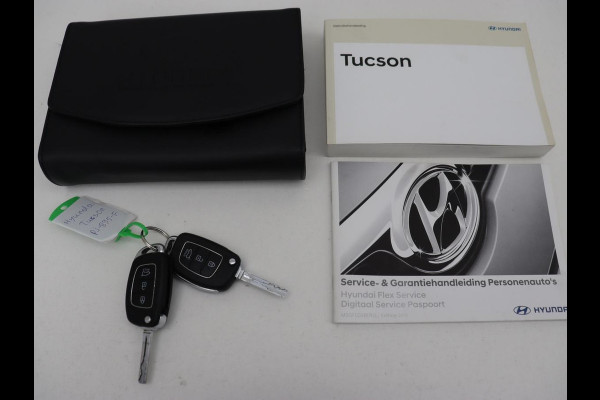 Hyundai Tucson 1.6 GDi Comfort | Trekhaak | Camera | Achterbankverwarming | Navigatie | Stoelverwarming | Climate control | Parkeerhulp | Cruise control | DAB | Regensensor Hyundai Tucson 1.6 GDi Comfort | Trekhaak | Camera | Achterbankverwarming | Navigatie | Stoelverwarming | Climate control | Parkeerhulp | Cruise control | DAB | Regensensor