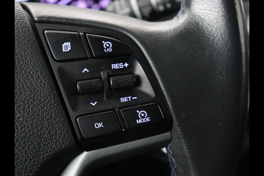 Hyundai Tucson 1.6 GDi Comfort | Trekhaak | Camera | Achterbankverwarming | Navigatie | Stoelverwarming | Climate control | Parkeerhulp | Cruise control | DAB | Regensensor Hyundai Tucson 1.6 GDi Comfort | Trekhaak | Camera | Achterbankverwarming | Navigatie | Stoelverwarming | Climate control | Parkeerhulp | Cruise control | DAB | Regensensor
