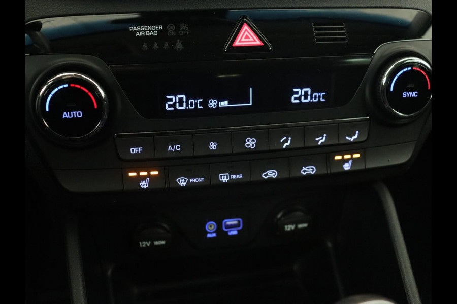 Hyundai Tucson 1.6 GDi Comfort | Trekhaak | Camera | Achterbankverwarming | Navigatie | Stoelverwarming | Climate control | Parkeerhulp | Cruise control | DAB | Regensensor Hyundai Tucson 1.6 GDi Comfort | Trekhaak | Camera | Achterbankverwarming | Navigatie | Stoelverwarming | Climate control | Parkeerhulp | Cruise control | DAB | Regensensor