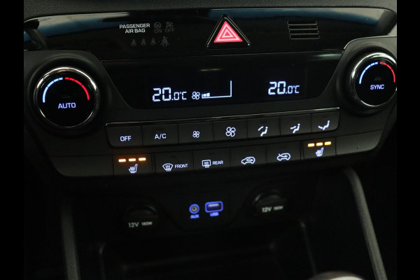 Hyundai Tucson 1.6 GDi Comfort | Trekhaak | Camera | Achterbankverwarming | Navigatie | Stoelverwarming | Climate control | Parkeerhulp | Cruise control | DAB | Regensensor Hyundai Tucson 1.6 GDi Comfort | Trekhaak | Camera | Achterbankverwarming | Navigatie | Stoelverwarming | Climate control | Parkeerhulp | Cruise control | DAB | Regensensor