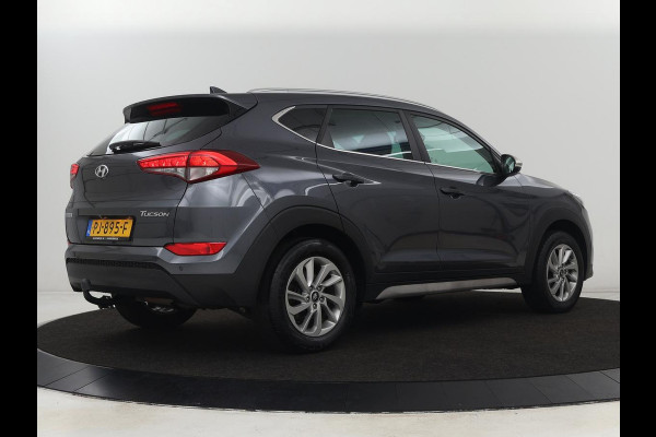 Hyundai Tucson 1.6 GDi Comfort | Trekhaak | Camera | Achterbankverwarming | Navigatie | Stoelverwarming | Climate control | Parkeerhulp | Cruise control | DAB | Regensensor Hyundai Tucson 1.6 GDi Comfort | Trekhaak | Camera | Achterbankverwarming | Navigatie | Stoelverwarming | Climate control | Parkeerhulp | Cruise control | DAB | Regensensor