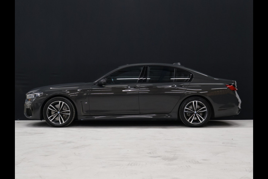 BMW 7 Serie 745e High Executive M Sport [SCHUIFKANTELDAK, HARMAN/KARDON, APPLE CARPLAY, ANDROID, ELEKTRISCH VERSTELBARE STOELEN V+A, STOELMASSAGE V+A, LUCHTVERING, 360 CAMERA, HEAD-UP, STUURVERWARMING, STOELVERKOELING, STOELVERWARM BMW 7 Serie 745e High Executive M Sport [SCHUIFKANTELDAK, HARMAN/KARDON, APPLE CARPLAY, ANDROID, ELEKTRISCH VERSTELBARE STOELEN V+A, STOELMASSAGE V+A, LUCHTVERING, 360 CAMERA, HEAD-UP, STUURVERWARMING, STOELVERKOELING, STOELVERWARM