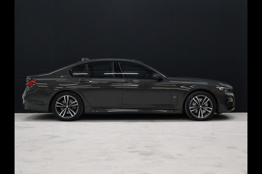 BMW 7 Serie 745e High Executive M Sport [SCHUIFKANTELDAK, HARMAN/KARDON, APPLE CARPLAY, ANDROID, ELEKTRISCH VERSTELBARE STOELEN V+A, STOELMASSAGE V+A, LUCHTVERING, 360 CAMERA, HEAD-UP, STUURVERWARMING, STOELVERKOELING, STOELVERWARM BMW 7 Serie 745e High Executive M Sport [SCHUIFKANTELDAK, HARMAN/KARDON, APPLE CARPLAY, ANDROID, ELEKTRISCH VERSTELBARE STOELEN V+A, STOELMASSAGE V+A, LUCHTVERING, 360 CAMERA, HEAD-UP, STUURVERWARMING, STOELVERKOELING, STOELVERWARM