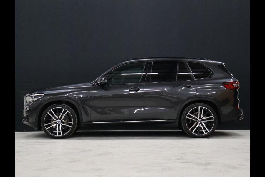 BMW X5 xDrive45e High Executive *WEEKAANBIEDINNG* [SCHUIFKANTELDAK, TREKHAAK INKLAPBAAR, MEMORY SEATS, HARMAN/KARDON, APPLE CARPLAY, ANDROID, 360 CAMERA, HEAD-UP, STUURVERWARMING, STOELVERWARMING, ADAPTIVE CRUISE, VOL LEDER