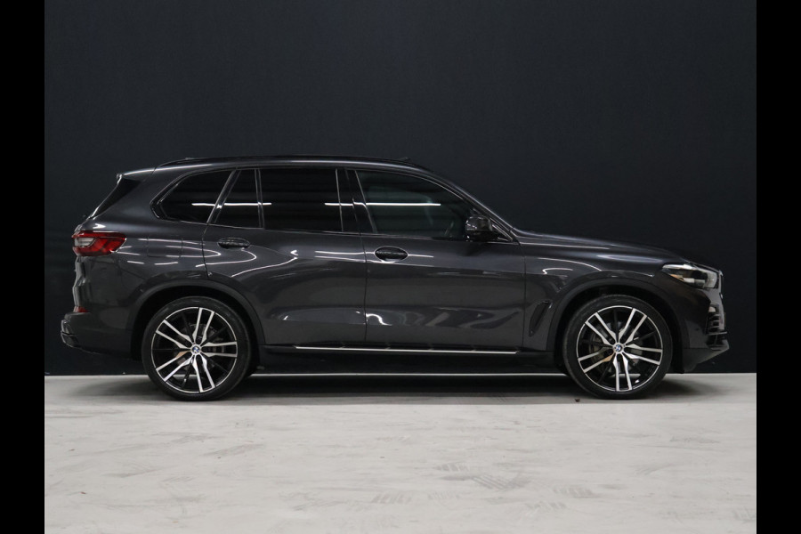 BMW X5 xDrive45e High Executive *WEEKAANBIEDINNG* [SCHUIFKANTELDAK, TREKHAAK INKLAPBAAR, MEMORY SEATS, HARMAN/KARDON, APPLE CARPLAY, ANDROID, 360 CAMERA, HEAD-UP, STUURVERWARMING, STOELVERWARMING, ADAPTIVE CRUISE, VOL LEDER