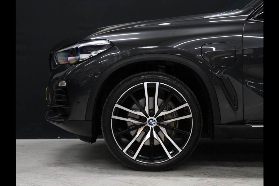 BMW X5 xDrive45e High Executive *WEEKAANBIEDINNG* [SCHUIFKANTELDAK, TREKHAAK INKLAPBAAR, MEMORY SEATS, HARMAN/KARDON, APPLE CARPLAY, ANDROID, 360 CAMERA, HEAD-UP, STUURVERWARMING, STOELVERWARMING, ADAPTIVE CRUISE, VOL LEDER