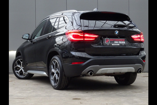 BMW X1 sDrive20i Orange Edition III * PANORAMADAK * HEAD-UP * DEALER ONDERH. !!
