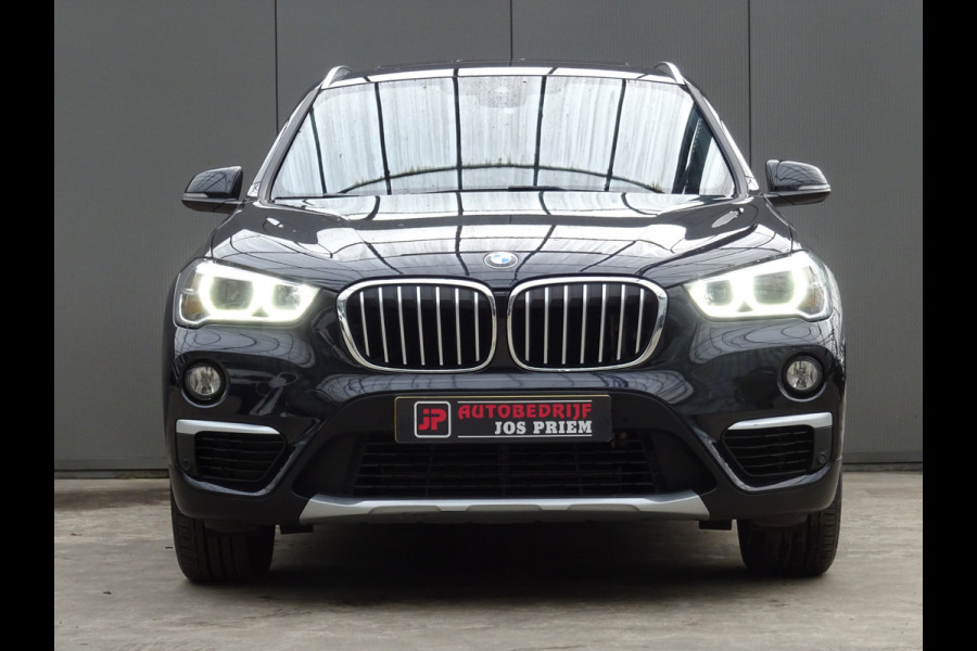BMW X1 sDrive20i Orange Edition III * PANORAMADAK * HEAD-UP * DEALER ONDERH. !!