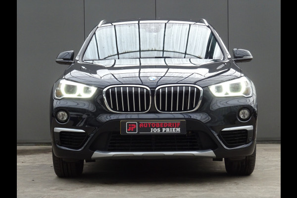 BMW X1 sDrive20i Orange Edition III * PANORAMADAK * HEAD-UP * DEALER ONDERH. !!