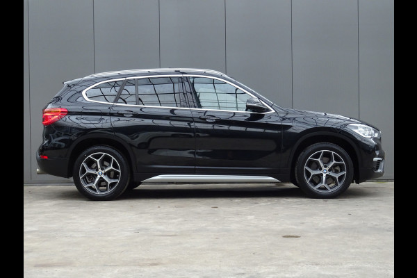 BMW X1 sDrive20i Orange Edition III * PANORAMADAK * HEAD-UP * DEALER ONDERH. !!