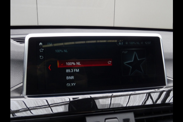 BMW X1 sDrive20i Orange Edition III * PANORAMADAK * HEAD-UP * DEALER ONDERH. !!