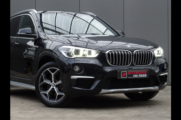 BMW X1 sDrive20i Orange Edition III * PANORAMADAK * HEAD-UP * DEALER ONDERH. !!