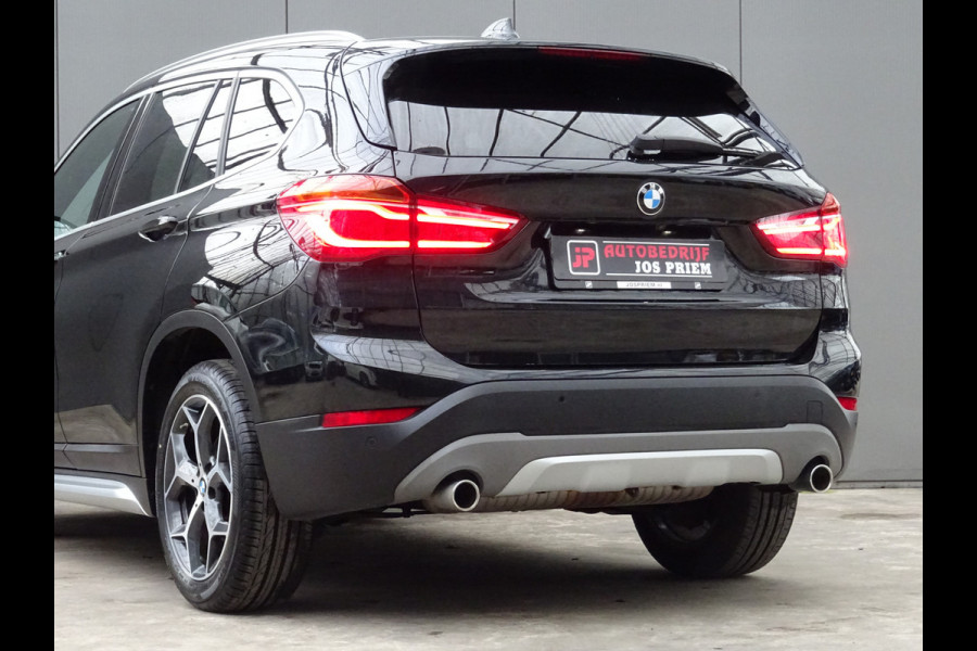 BMW X1 sDrive20i Orange Edition III * PANORAMADAK * HEAD-UP * DEALER ONDERH. !!