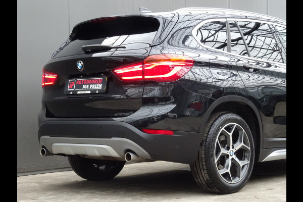 BMW X1 sDrive20i Orange Edition III * PANORAMADAK * HEAD-UP * DEALER ONDERH. !!