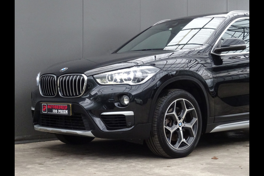 BMW X1 sDrive20i Orange Edition III * PANORAMADAK * HEAD-UP * DEALER ONDERH. !!