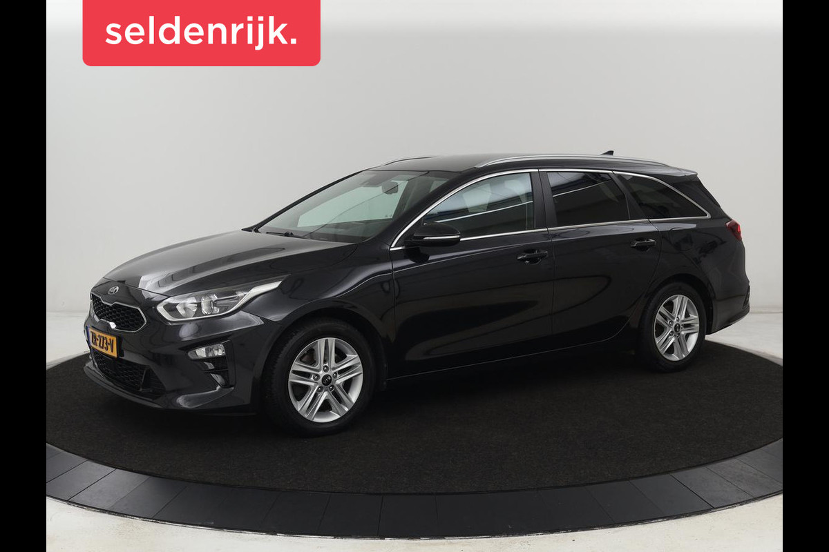 Kia Ceed 1.0 T-GDi DynamicPlusLine | Trekhaak | Stoel & stuurverwarming | Camera | Carplay | Navigatie | Climate control | Parkeerhulp | Cruise control | Half leder