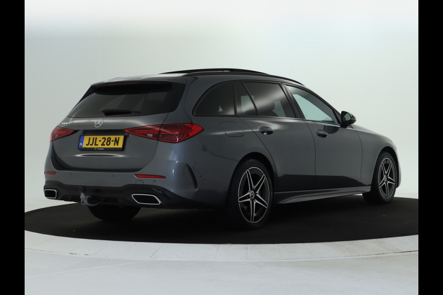 Mercedes-Benz C-Klasse Estate 300 e AMG Plug-In Hybride AMG Line | Night Pakket | Trekhaak | Panorama Schuif-Kanteldak | Memory Voorstoelen. Inclusief 24 maanden Mercedes-Benz Certified garantie voor Europa.