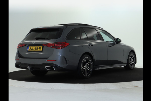 Mercedes-Benz C-Klasse Estate 300 e AMG Plug-In Hybride AMG Line | Night Pakket | Trekhaak | Panorama Schuif-Kanteldak | Memory Voorstoelen. Inclusief 24 maanden Mercedes-Benz Certified garantie voor Europa.