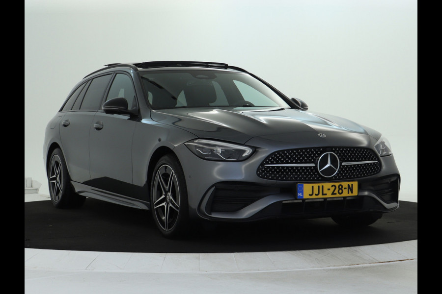 Mercedes-Benz C-Klasse Estate 300 e AMG Plug-In Hybride AMG Line | Night Pakket | Trekhaak | Panorama Schuif-Kanteldak | Memory Voorstoelen. Inclusief 24 maanden Mercedes-Benz Certified garantie voor Europa.