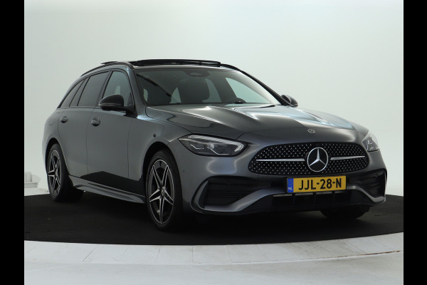 Mercedes-Benz C-Klasse Estate 300 e AMG Plug-In Hybride AMG Line | Night Pakket | Trekhaak | Panorama Schuif-Kanteldak | Memory Voorstoelen. Inclusief 24 maanden Mercedes-Benz Certified garantie voor Europa.