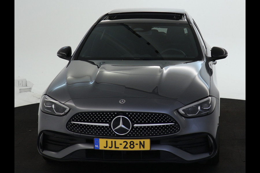 Mercedes-Benz C-Klasse Estate 300 e AMG Plug-In Hybride AMG Line | Night Pakket | Trekhaak | Panorama Schuif-Kanteldak | Memory Voorstoelen. Inclusief 24 maanden Mercedes-Benz Certified garantie voor Europa.