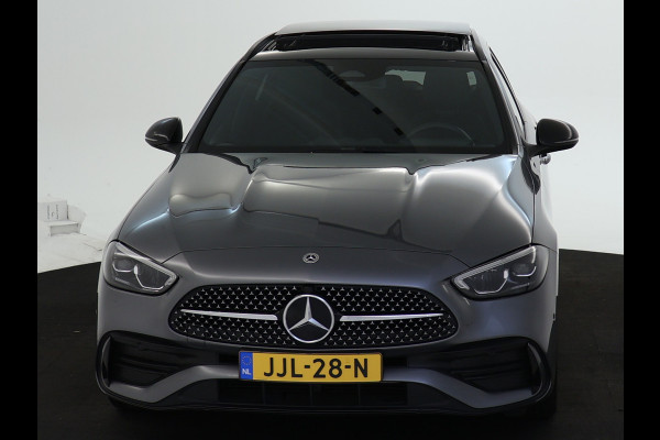 Mercedes-Benz C-Klasse Estate 300 e AMG Plug-In Hybride AMG Line | Night Pakket | Trekhaak | Panorama Schuif-Kanteldak | Memory Voorstoelen. Inclusief 24 maanden Mercedes-Benz Certified garantie voor Europa.