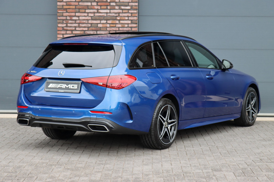 Mercedes-Benz C-Klasse Estate 300 e AMG Line | Panoramadak | Memory | Distronic | Trekhaak | Night Pakket | Dodehoekassistent | Camera | Sfeerverlichting | Mercedes-Benz C-Klasse Estate 300 e AMG Line | Panoramadak | Memory | Distronic | Trekhaak | Night Pakket | Dodehoekassistent | Camera | Sfeerverlichting |