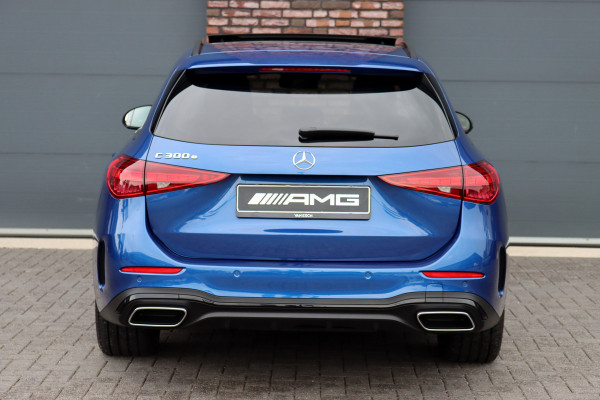 Mercedes-Benz C-Klasse Estate 300 e AMG Line | Panoramadak | Memory | Distronic | Trekhaak | Night Pakket | Dodehoekassistent | Camera | Sfeerverlichting | Mercedes-Benz C-Klasse Estate 300 e AMG Line | Panoramadak | Memory | Distronic | Trekhaak | Night Pakket | Dodehoekassistent | Camera | Sfeerverlichting |