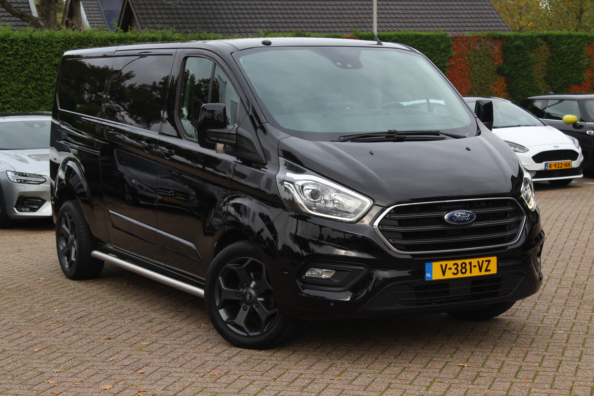 Ford Transit Custom 300 2.0 TDCI L2H1 Limited / Trekhaak / Camera / Leder / 2x Zijschuifdeur / Xenon / Dodehoek / 16'' / Navigatie / Dodehoek / Cruise Control Ford Transit Custom 300 2.0 TDCI L2H1 Limited / Trekhaak / Camera / Leder / 2x Zijschuifdeur / Xenon / Dodehoek / 16'' / Navigatie / Dodehoek / Cruise Control
