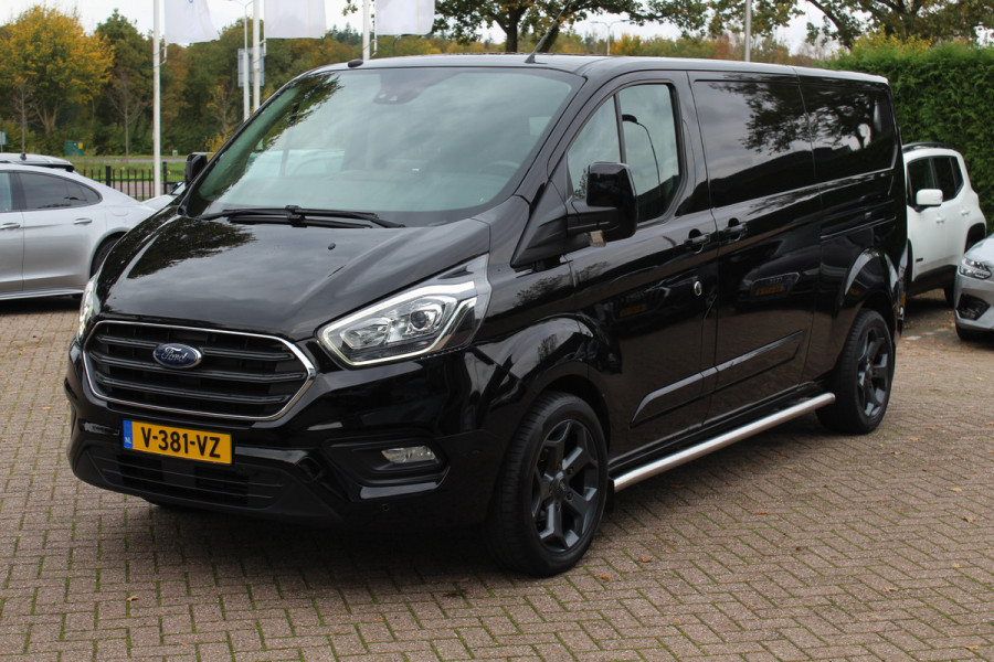Ford Transit Custom 300 2.0 TDCI L2H1 Limited / Trekhaak / Camera / Leder / 2x Zijschuifdeur / Xenon / Dodehoek / 16'' / Navigatie / Dodehoek / Cruise Control Ford Transit Custom 300 2.0 TDCI L2H1 Limited / Trekhaak / Camera / Leder / 2x Zijschuifdeur / Xenon / Dodehoek / 16'' / Navigatie / Dodehoek / Cruise Control