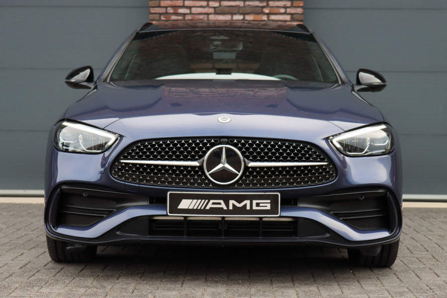 Mercedes-Benz C-Klasse Estate 300 e Star Edition AMG Line | Panoramadak | Memory | Camera | Trekhaak | High Perf. LED | Nightpakket | Sfeerverlichting Premium | Stoelverwarming | Dodehoekassistent |