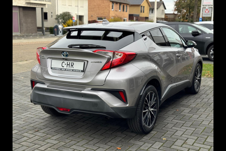 Toyota C-HR 1.8 Hybrid Executive | Stoelverwarming, Navigatie, Keyless, Leer/Stof, 18 Inch Toyota C-HR 1.8 Hybrid Executive | Stoelverwarming, Navigatie, Keyless, Leer/Stof, 18 Inch