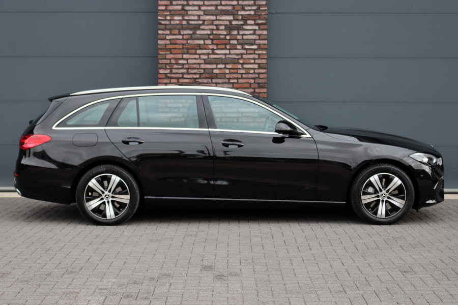 Mercedes-Benz C-Klasse Estate 300 e Luxury Line | Panoramadak | Camera | Cruise Control | Sfeerverlichting | Dodehoekassistent | High Perf. LED | Apple Carplay/Android Auto | Stoelverwarming | Mercedes-Benz C-Klasse Estate 300 e Luxury Line | Panoramadak | Camera | Cruise Control | Sfeerverlichting | Dodehoekassistent | High Perf. LED | Apple Carplay/Android Auto | Stoelverwarming |