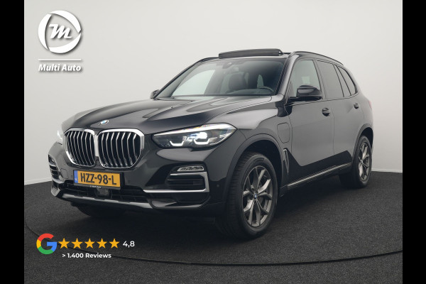BMW X5 xDrive45e High Executive Plug In Hybrid 395pk Dealer O.H PHEV | Trekhaak Af Fabriek | Luchtvering | Panodak | Head Up | Adaptive Cruise | 360 Camera | Adaptief Onderstel | Lederen Sportstoelen Memory & Verwarmd | Apple Carplay | Sfee