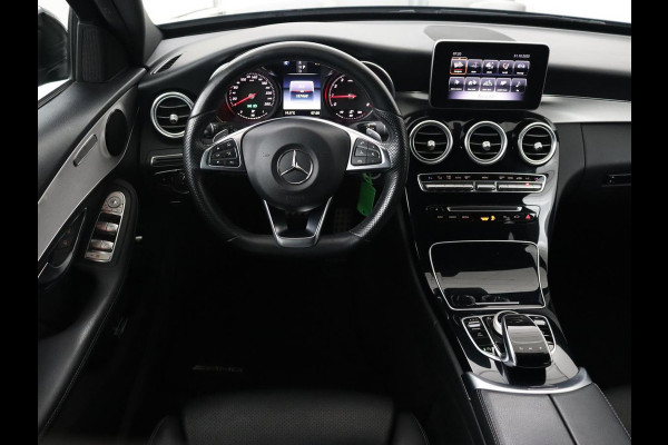 Mercedes-Benz C-Klasse 200 AMG Night | Leder | Stoelverwarming | Full LED | Park Assist | Navigatie | Climate control | Cruise control | Bluetooth