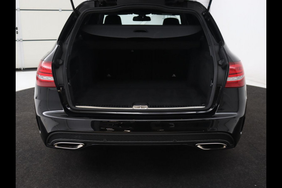 Mercedes-Benz C-Klasse 200 AMG Night | Leder | Stoelverwarming | Full LED | Park Assist | Navigatie | Climate control | Cruise control | Bluetooth