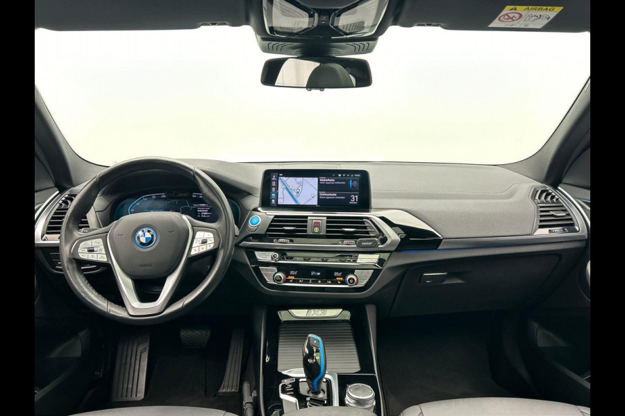 BMW iX3 Executive 80 kWh * SOH 98% * Pano/dak Trekhaak Camera Origineel NL