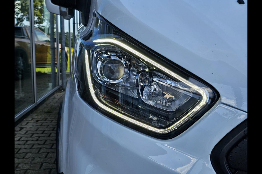 Ford Transit Custom 300 2.0 TDCI L2H1 Trail | Glasslook panelen | Raptor grille | Camera | Trekhaak | Leder | Voorruitverwarming | Airco | Cruise control etc.