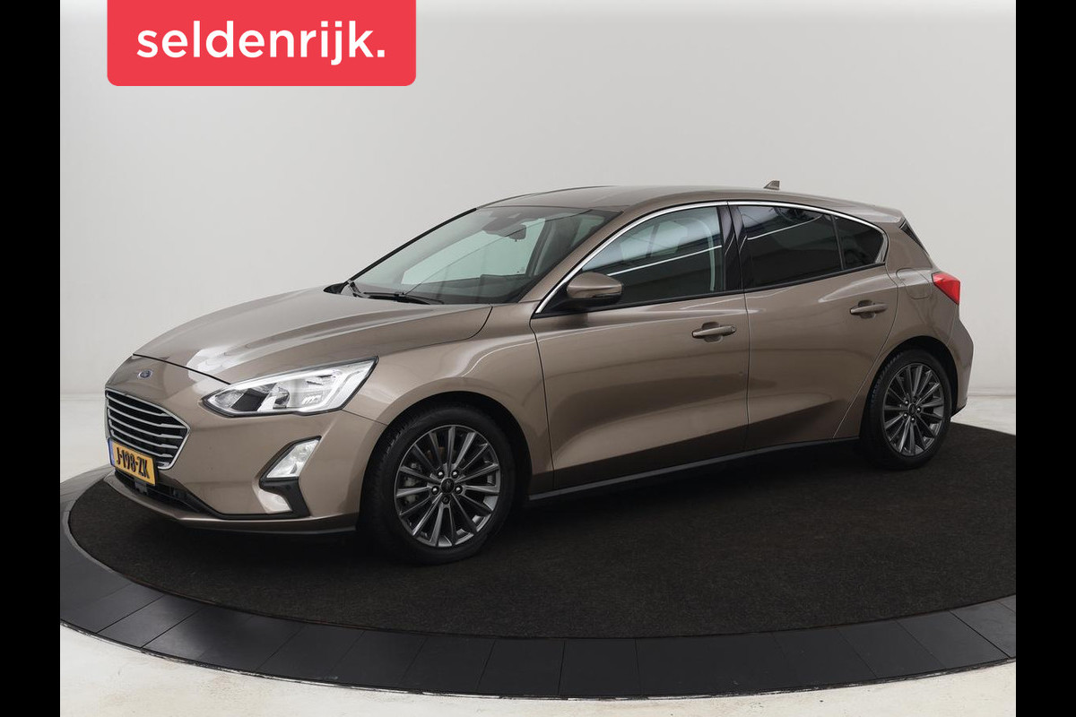 Ford Focus 1.0 EcoBoost Titanium | Trekhaak | Stoel & stuurverwarming | Carplay | Navigatie | Climate control | Keyless | Cruise control | Parkeerhulp | Bluetooth