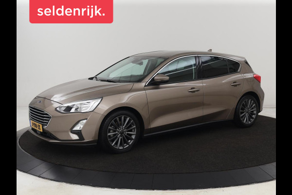 Ford Focus 1.0 EcoBoost Titanium | Trekhaak | Stoel & stuurverwarming | Carplay | Navigatie | Climate control | Keyless | Cruise control | Parkeerhulp | Bluetooth