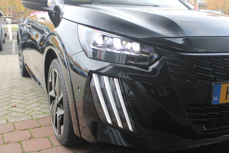 Peugeot 208 GT 1.2 Hybrid 145PK e-DCS6 | NAVIGATIE | DRAADLOZE APPLE CARPLAY/ANDROID AUTO | CAMERA VOOR + ACHTER | FULL LED KOPLAMPEN | LICHTMETALEN VELGEN 17" | DODEHOEK DETECTIE | DRAADLOZE TELEFOONLADER | KEYLESS ENTRY/START | DAB+ RADIO | ADAPTIVE CRUISE CONTROL |